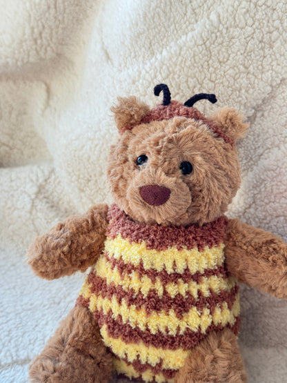 Handmade bumble bee outfit for Jellycat Bartholomew Bear featuring crochet wings, striped bee body, and cozy plush styling.
