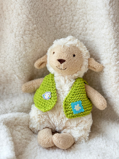 Lollie Lamb styled in a bright green crochet vest for 18cm Jellycat plush