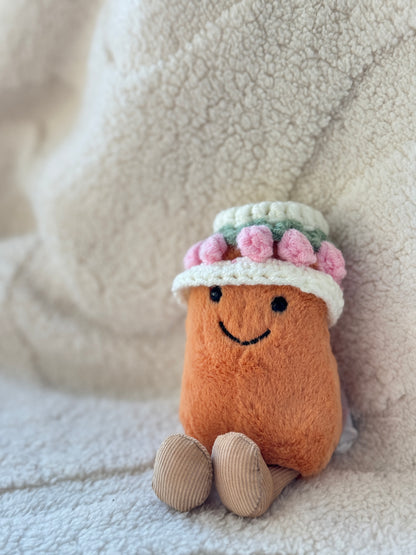 Cute Jellycat Amuseables Bean styled with a handmade tulip bonnet inspired by spring flowers and cottagecore aesthetics.
